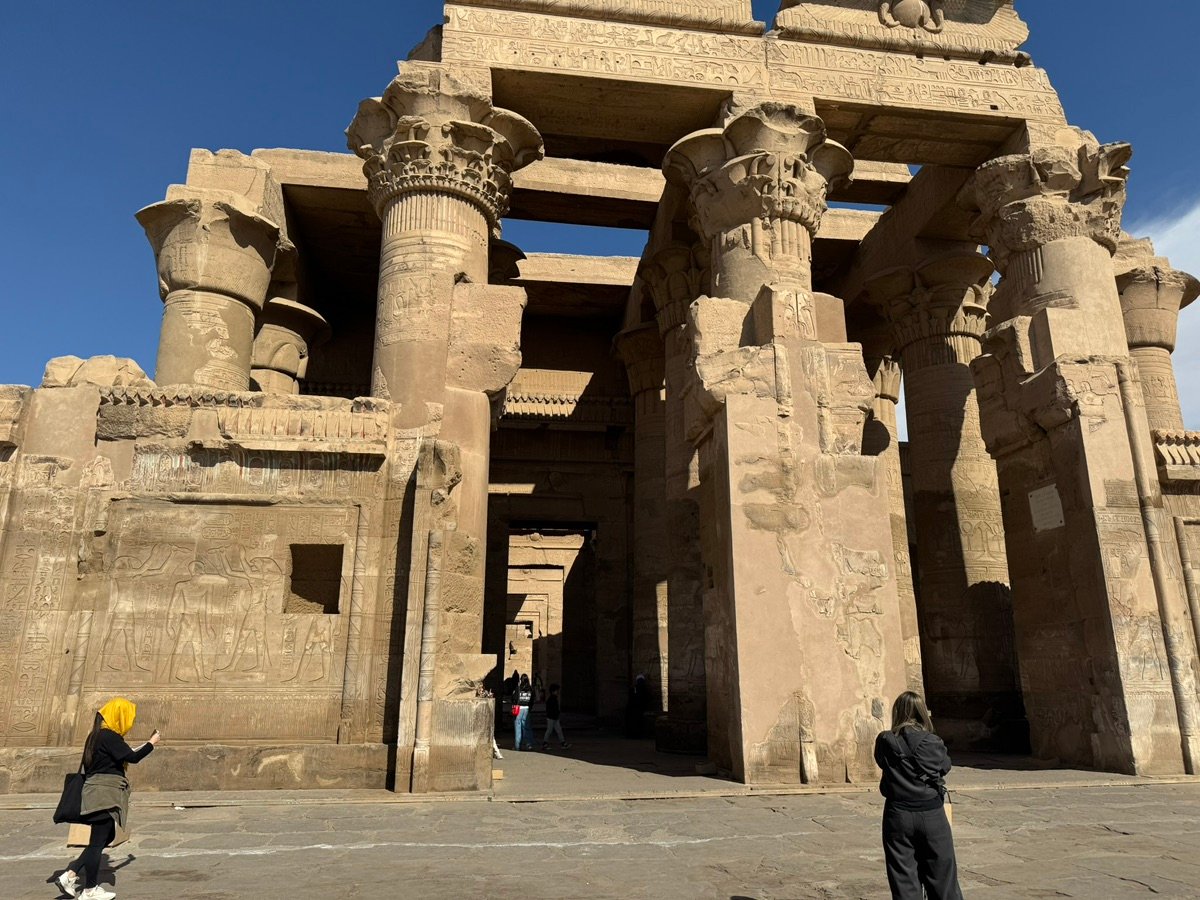 Upper section of the Temple of Kom Ombo wall, showing a square cut-out and weathered stone.