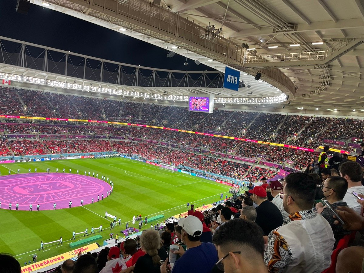 Interior view of Ahmad Bin Ali Stadium, showing the large screen and spectator stands