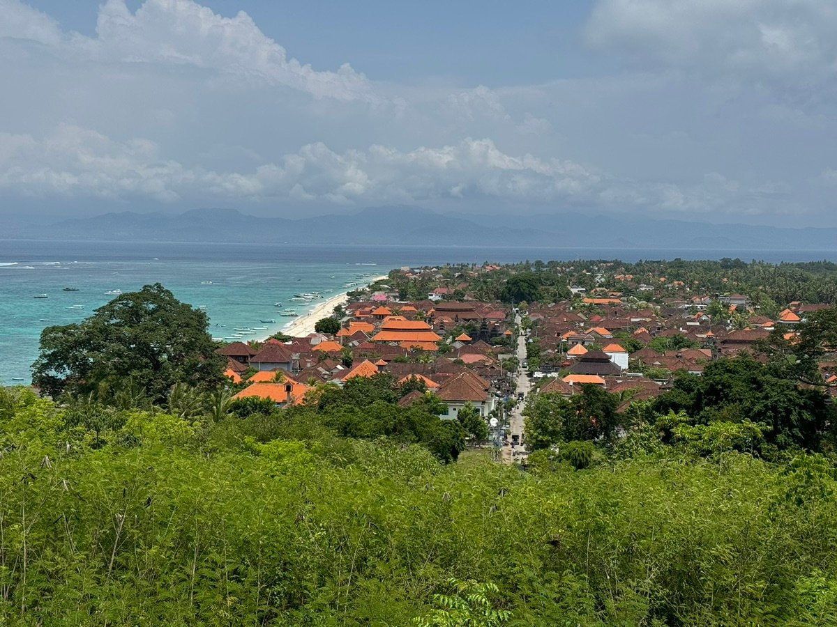 Collection of boats in the blue sea of Nusa Lembongan