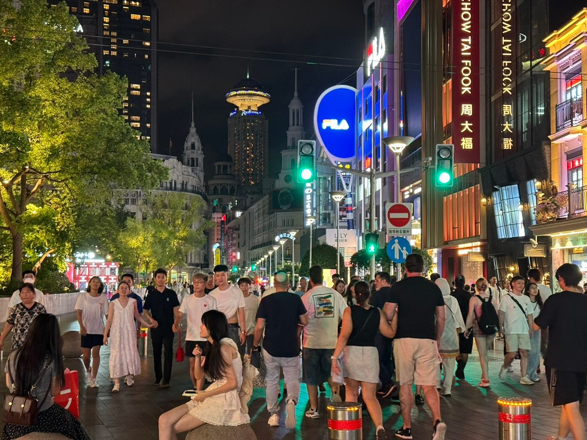 Ornate European-style buildings illuminated at night on Nanjing Road