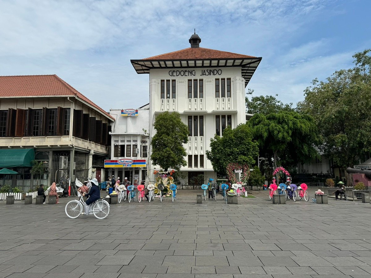 Si Jagur Cannon in the center of Fatahillah Square with historical buildings in the background