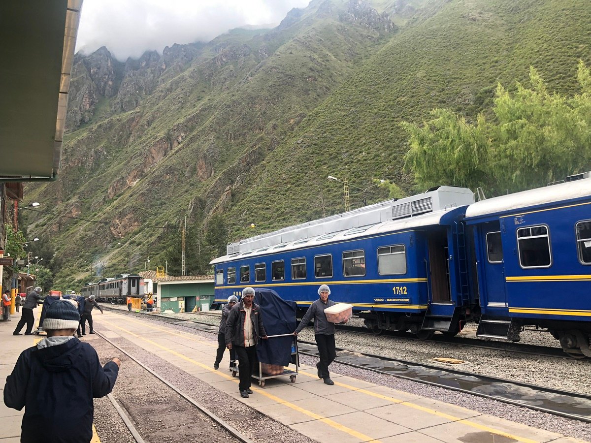 PeruRail train with Sacred Valley mountains in background