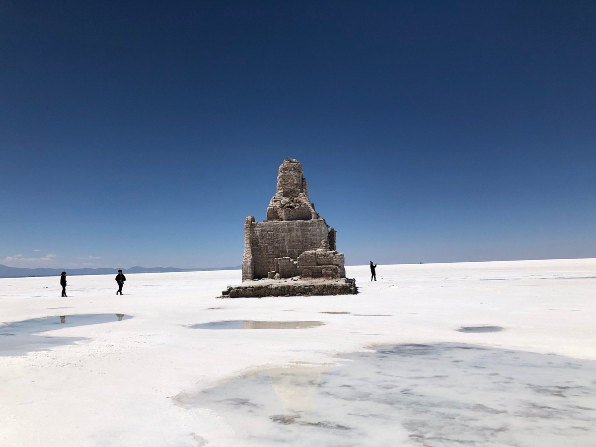 Shallow water reflecting the sky on Salar de Uyuni