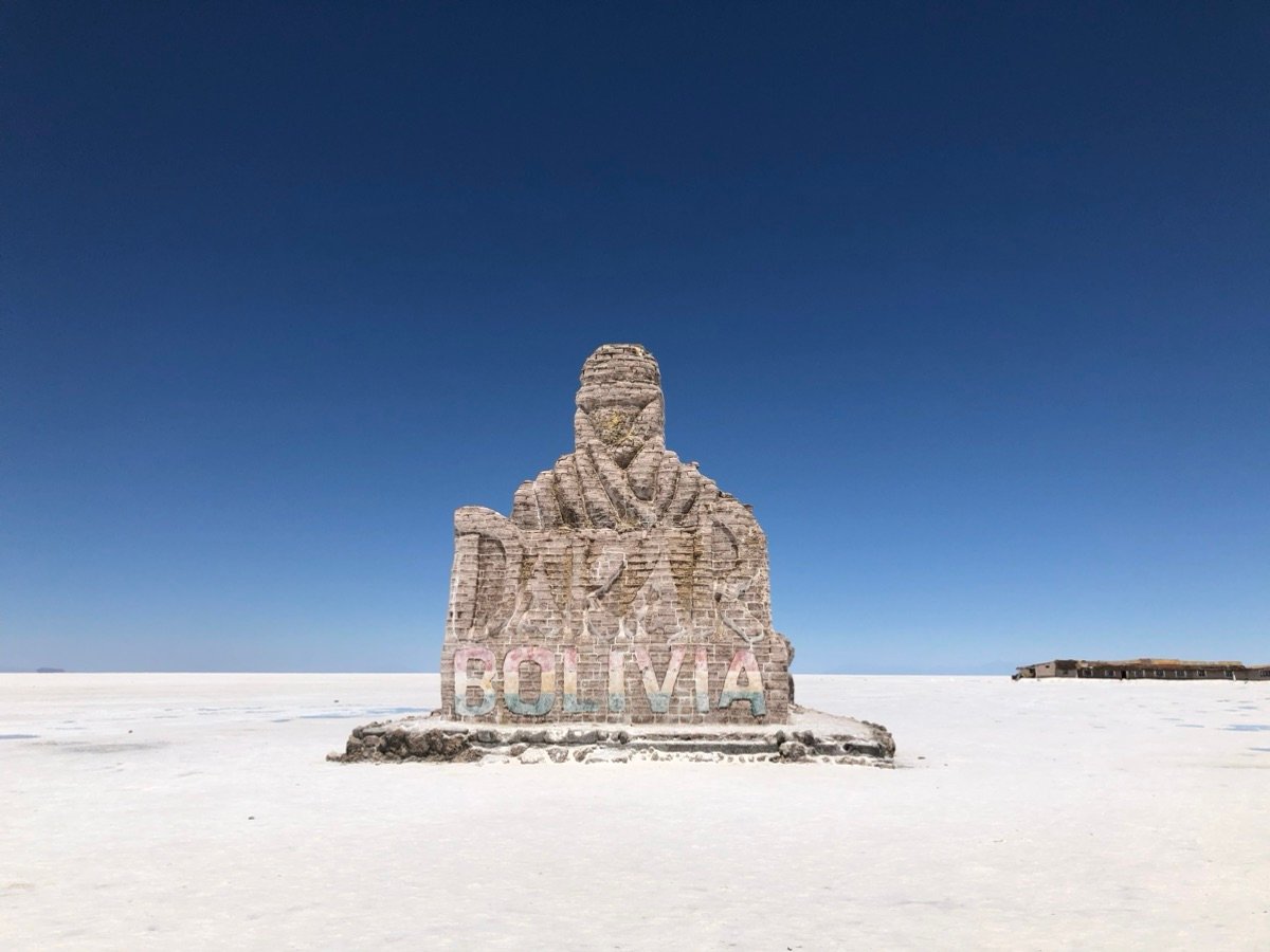 The Dakar Bolivia salt monument standing in the Salar de Uyuni.